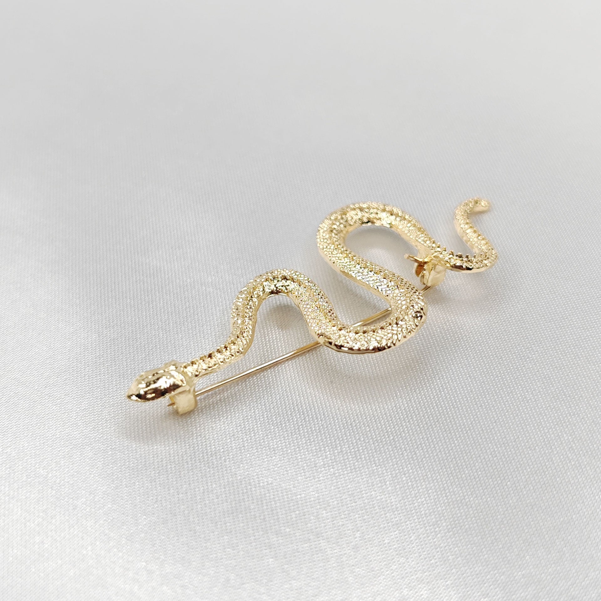 Broche bijou serpent doré