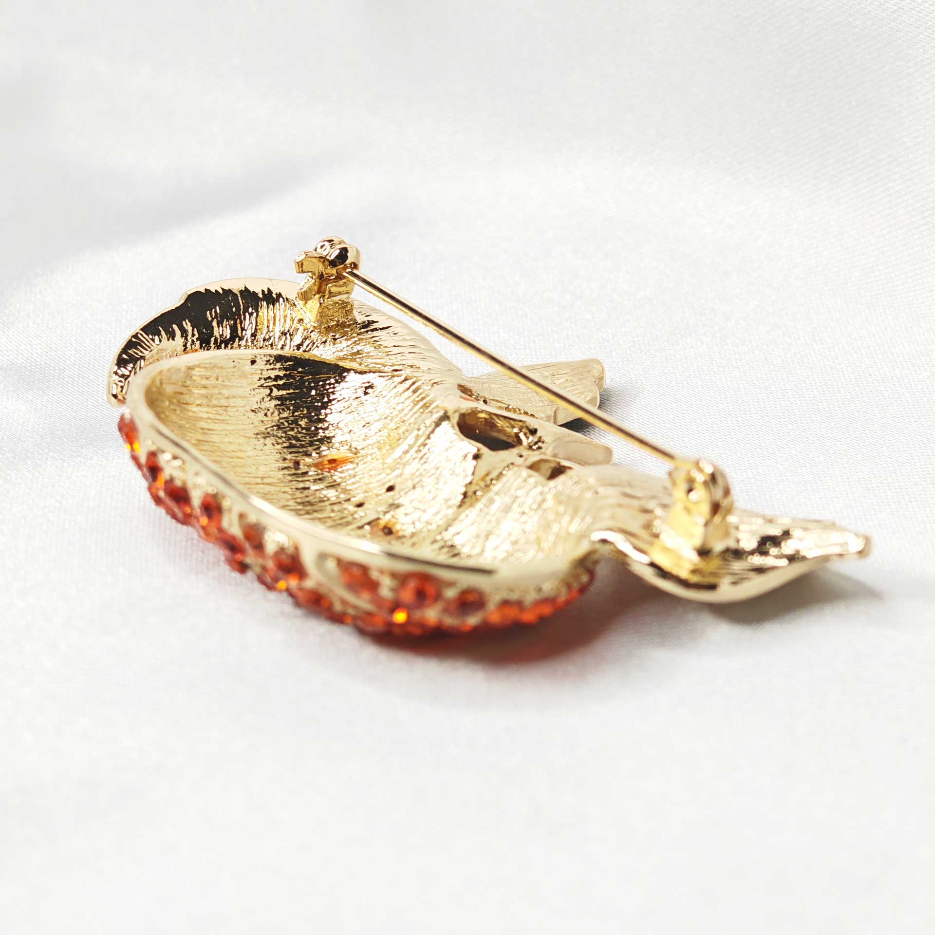 photo de l'attache épinglette de la broche citrouille