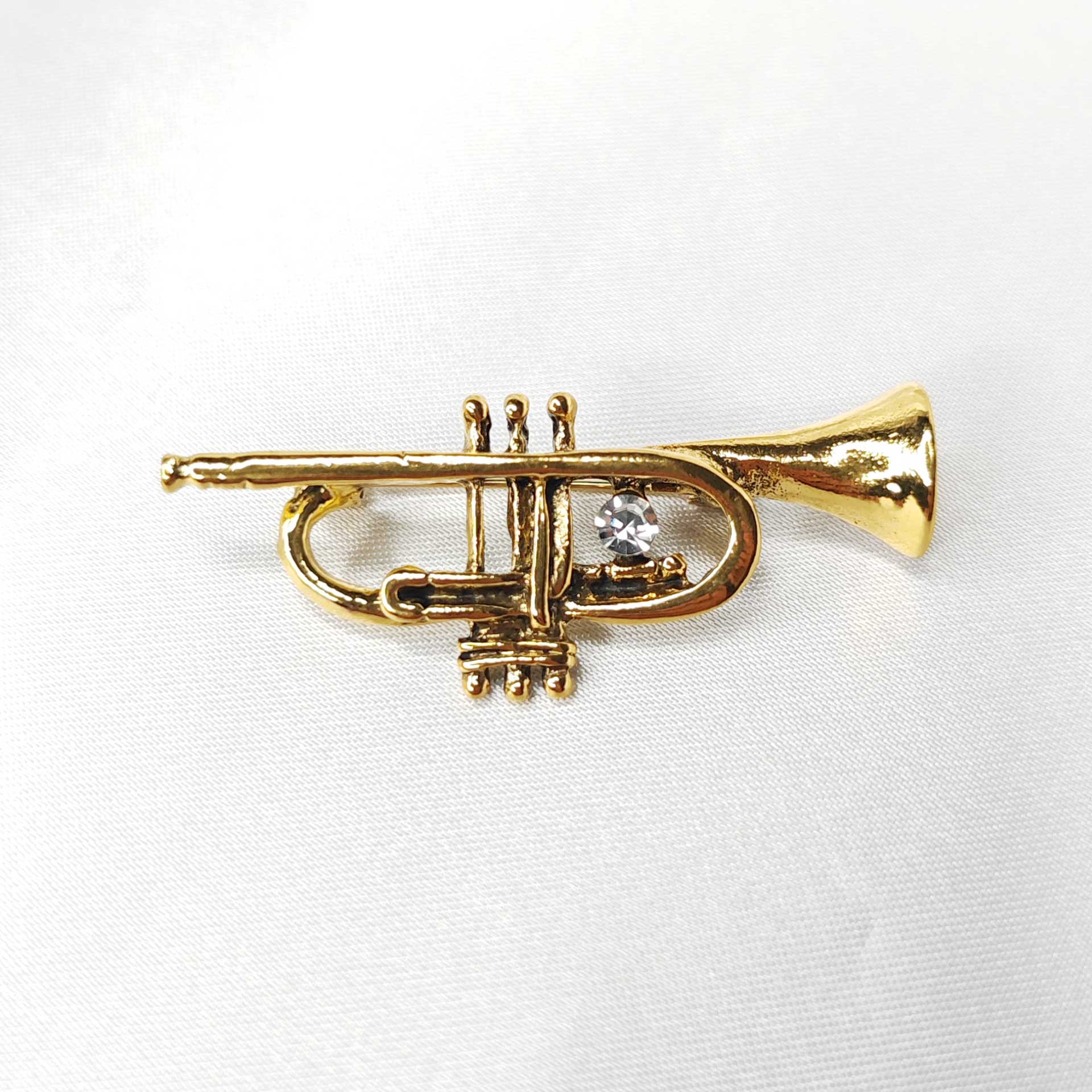 Broche bijou trompette dorée photo 2