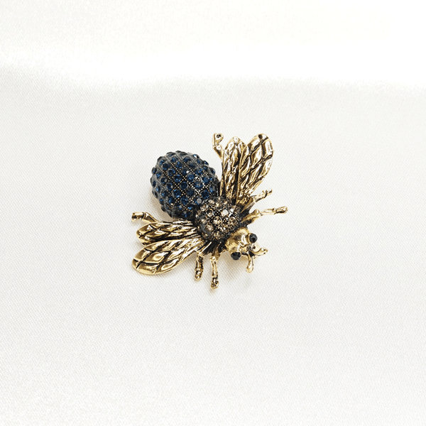 Broche abeille bleue dorée