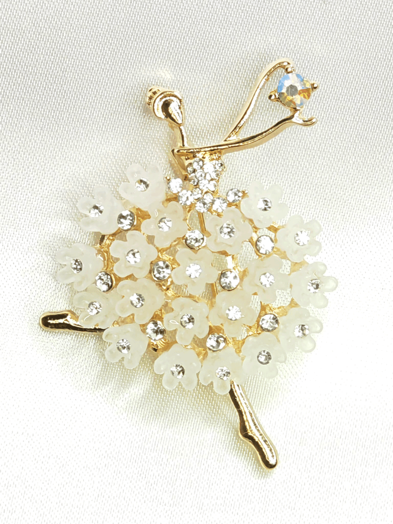 Broche danseuse en robe de cristaux et fleurs blanches