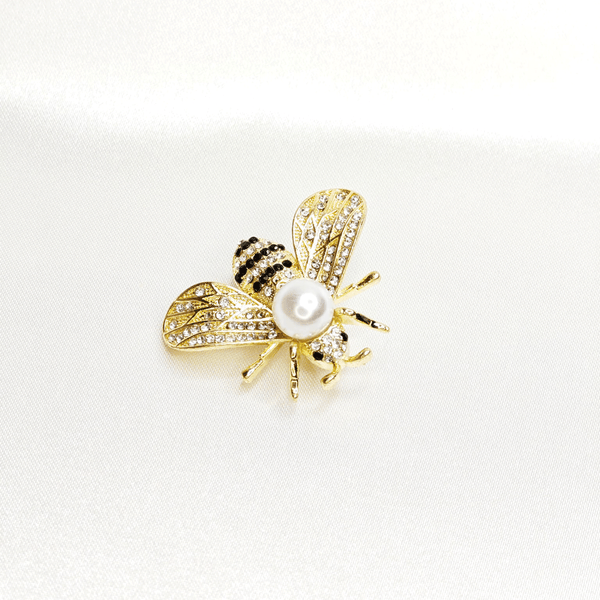 Broche abeille dorée et perle blanche