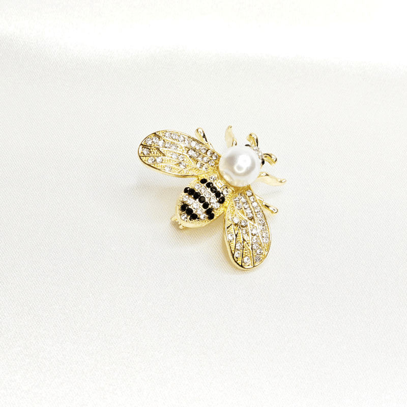 Broche abeille dorée et perle blanche