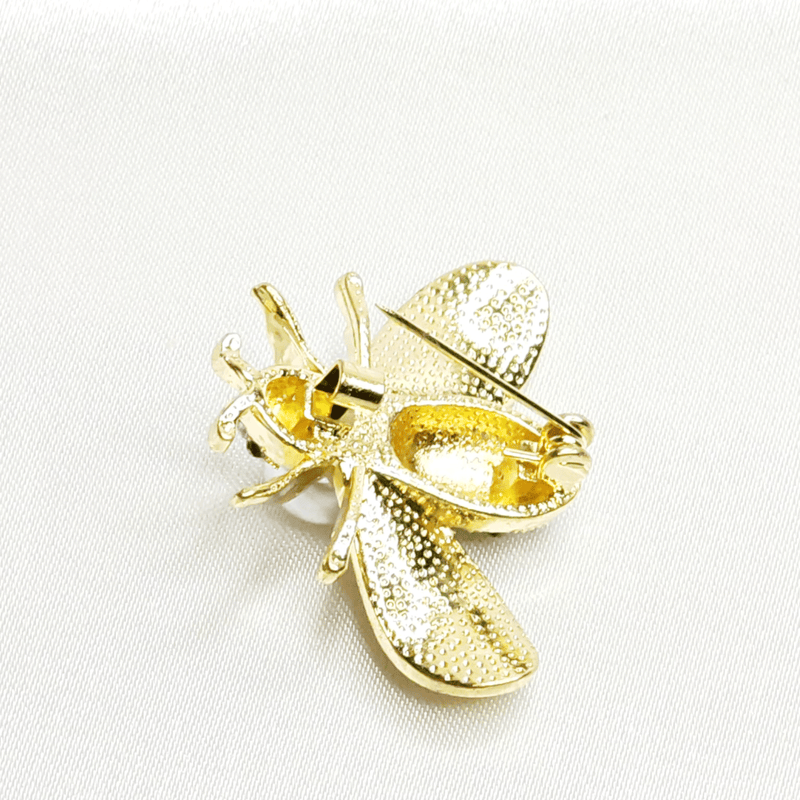 Broche abeille dorée et perle blanche