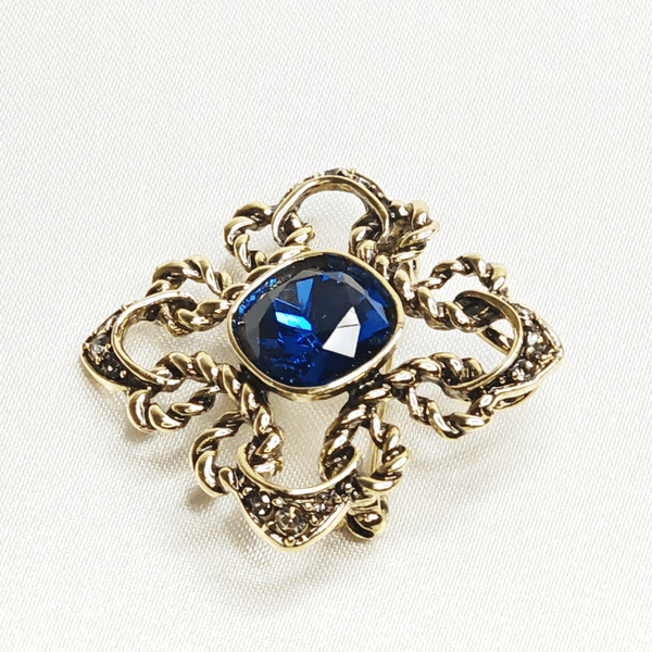 Broche baroque étoile saphir