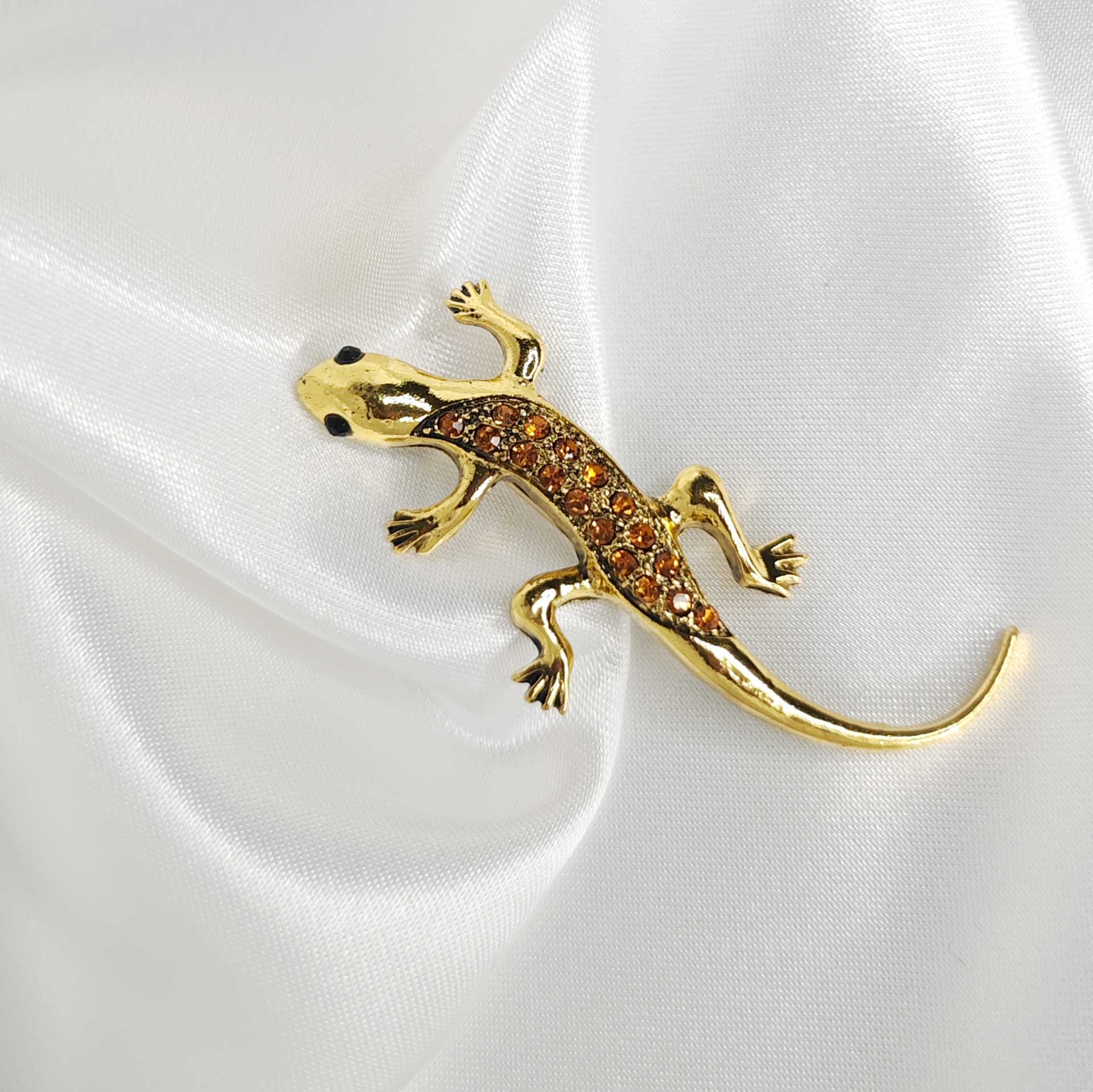 Photo 1 de la broche lézard style vintage incrustée de strass ambrés