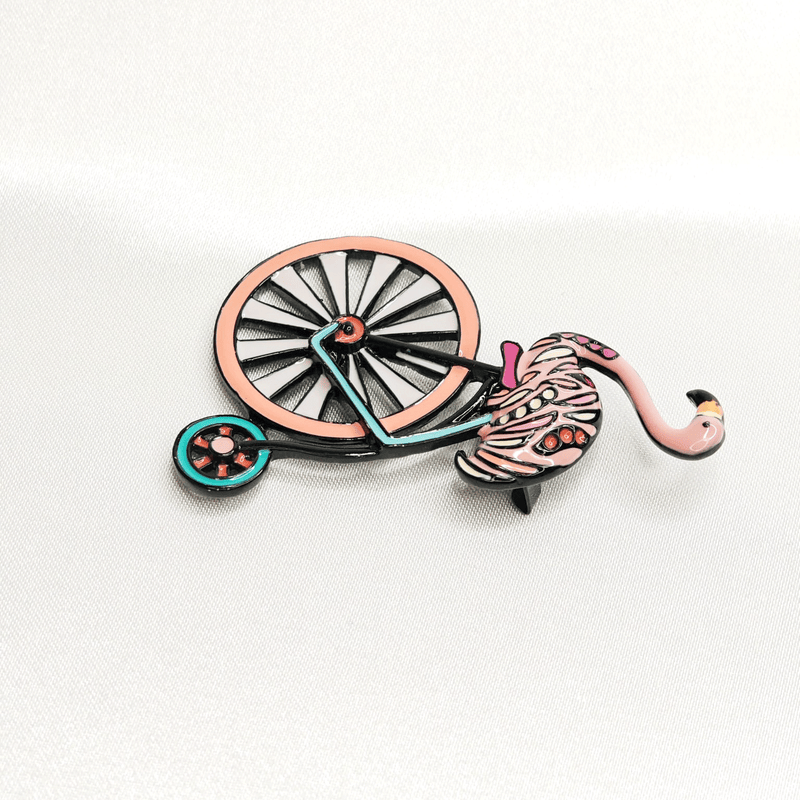 Broche flamant rose vintage à vélo