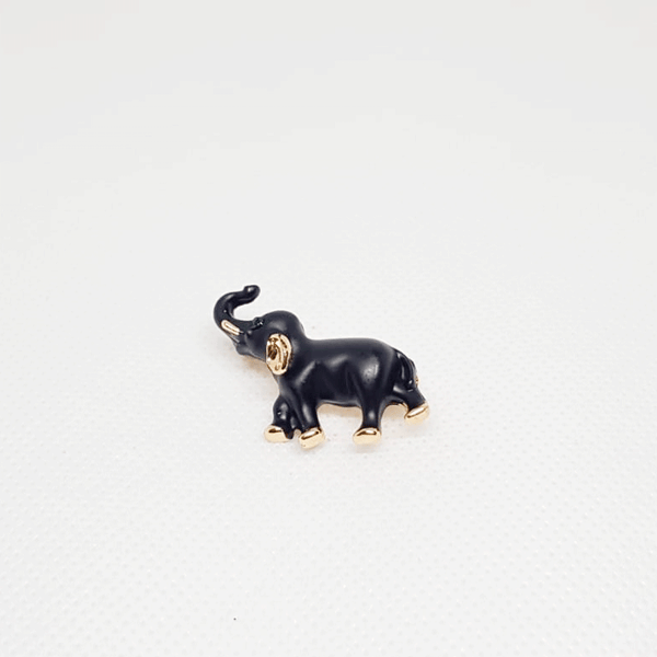 Broche elephant noir et doree.