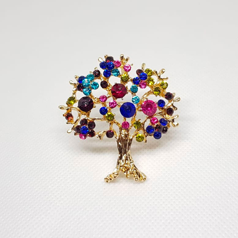 Broche arbre de vie couleur dorée et strass multicolore.