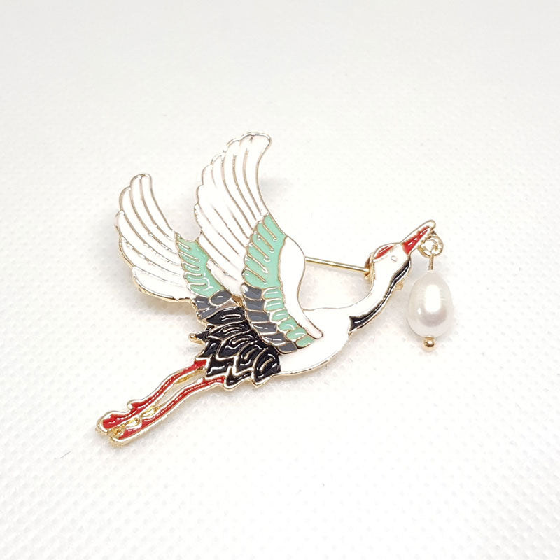 Broche Cigogne et Perle.