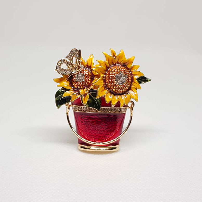 Broche dorée pot de fleurs rouge et tournesol